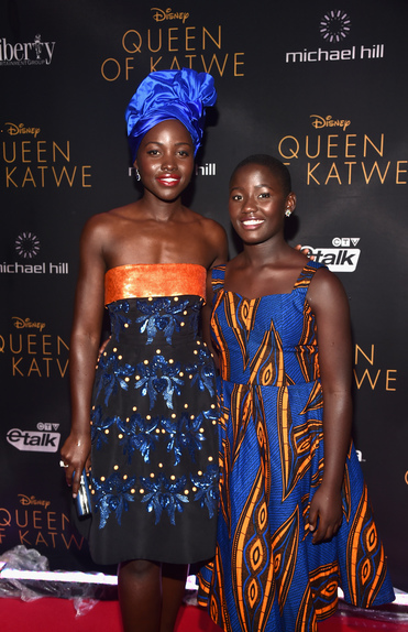 Actresses Lupita Nyong'o (L) and Madina Nalwanga arrive at the world premiere of Disney’s “Queen of Katwe” at Roy Thompson Hall